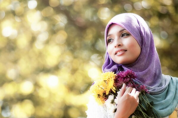 Lolly Eakin con flores hermosa foto