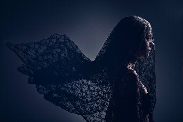 Young widow girl with black veil