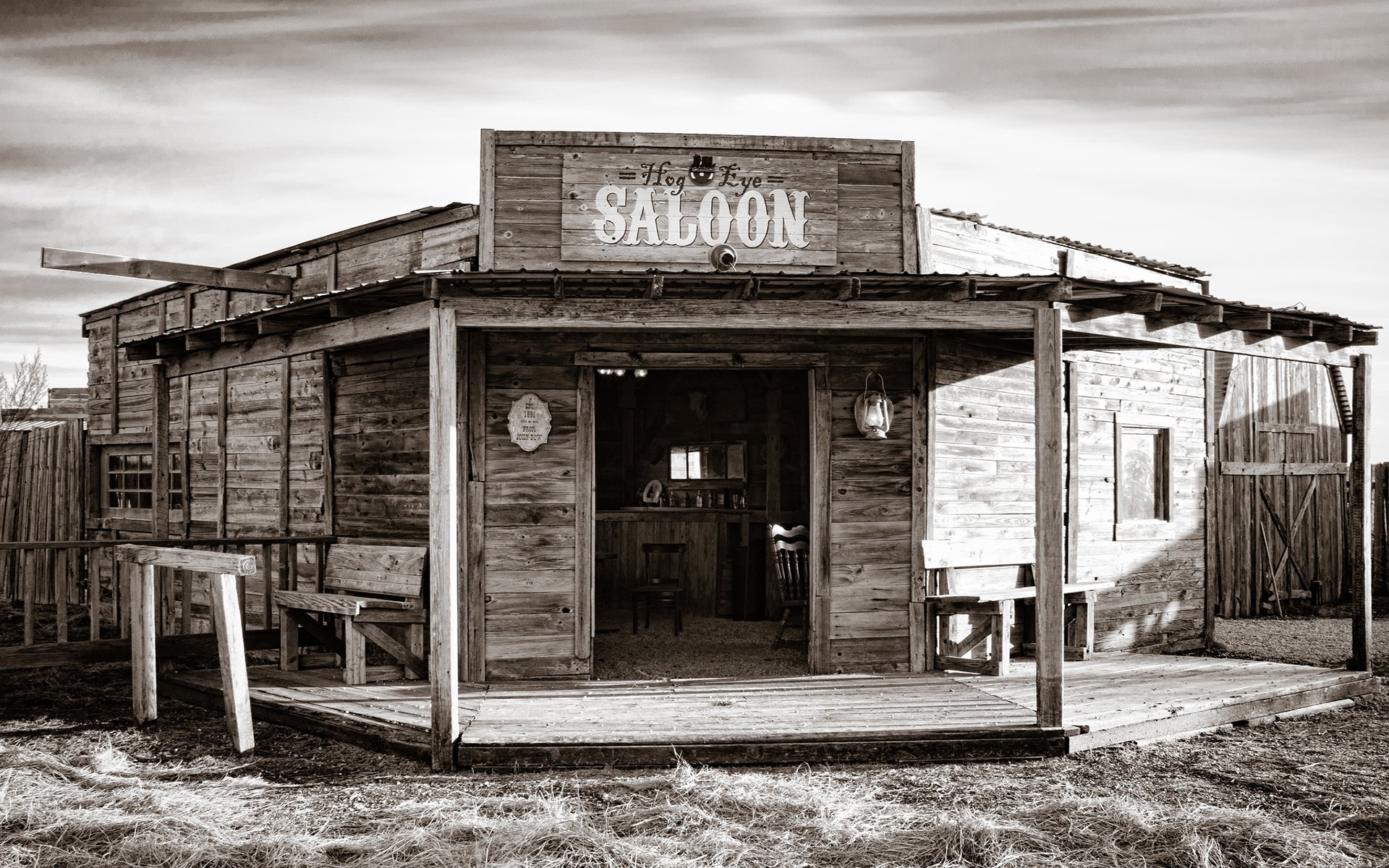 bar saloon wood style wild the west atmospheric sunny light shadow black and white