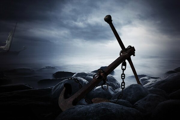 The night sea. Anchor with chain