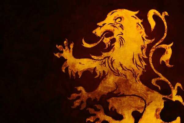 A fiery lion on a dark background. emblem