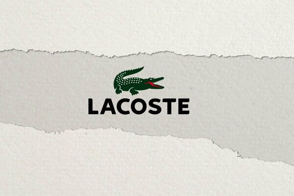 Logo with a crocodile on a gray background