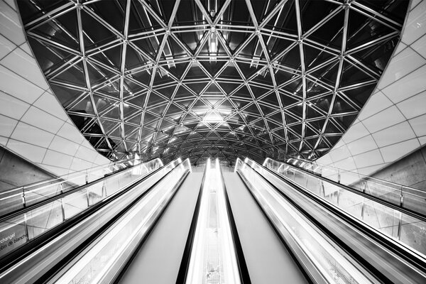 Metro architecture. Escalator and lamps