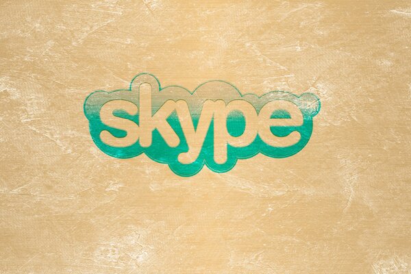 Das Skype-Logo. Auf gelbem Hintergrund