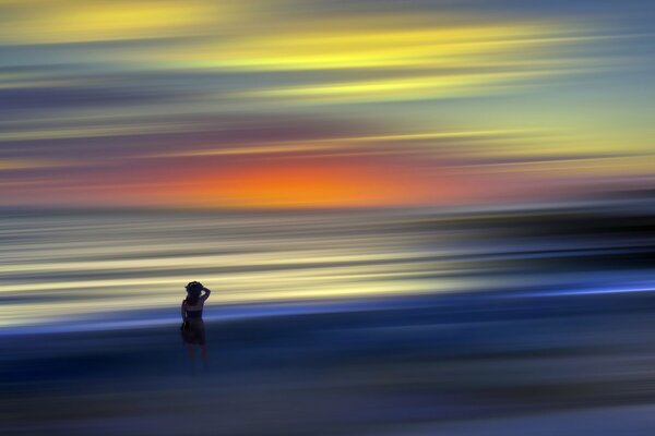 Multicolored stripes create the illusion of a sunset over the sea