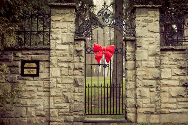 Festive bow on the gate of the house