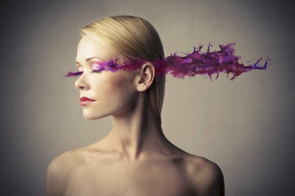 Unusual portrait of a blonde with makeup