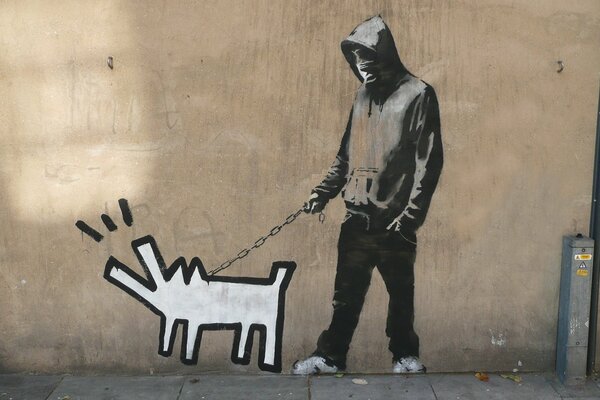 Der Kerl geht mit dem Hund Banksy spazieren und sie bellt