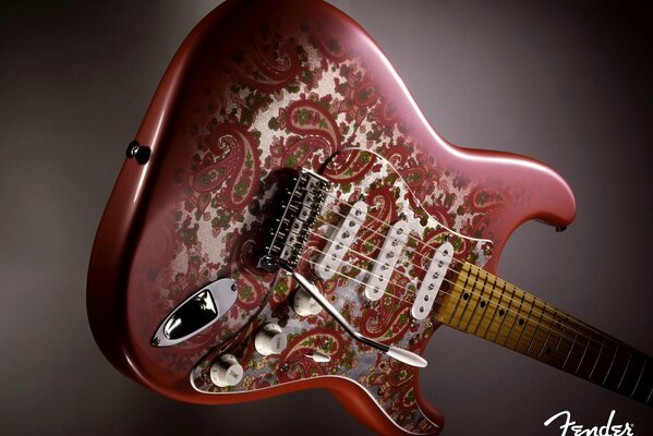 Original decorated red guitar