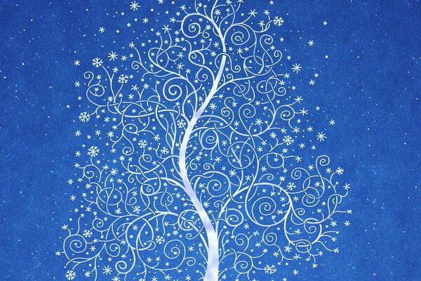 Arbre dans un motif de neige sur fond de ciel bleu