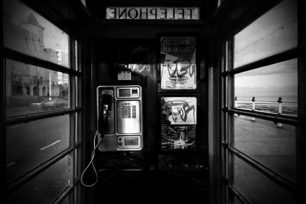 Black and white photo of a phone booth