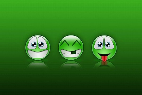 Emoticonos verdes con diferentes sonrisas