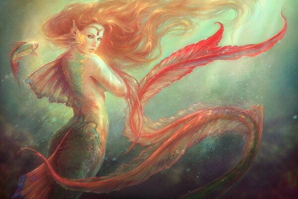 Chica sirena con el pelo rojo ardiente