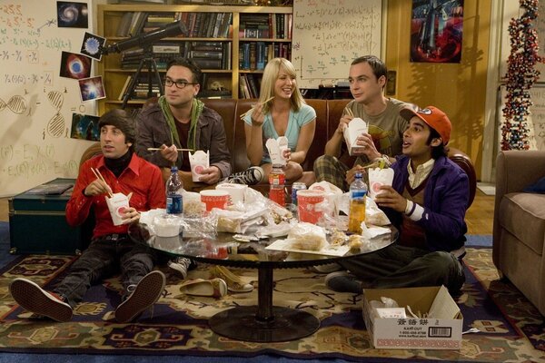 The actors from the TV series the big Bang theory are sitting together