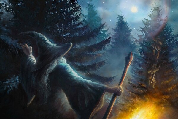 Il mago Gandalf, bastone in mano, spegne il fuoco notturno a Bosco Atro