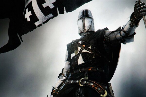 Un luchador con una bandera en sus manos sobre un fondo uniforme