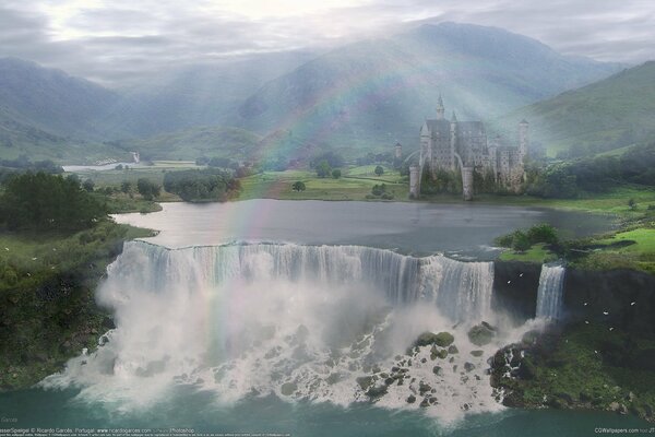 Castello sotto l arcobaleno in una valle vicino a una cascata