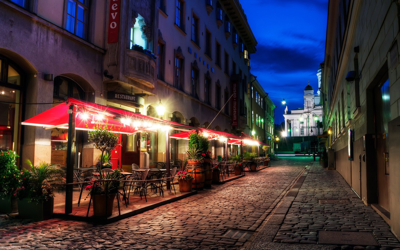 the sidewalk restaurant finland helsinki street in the evening