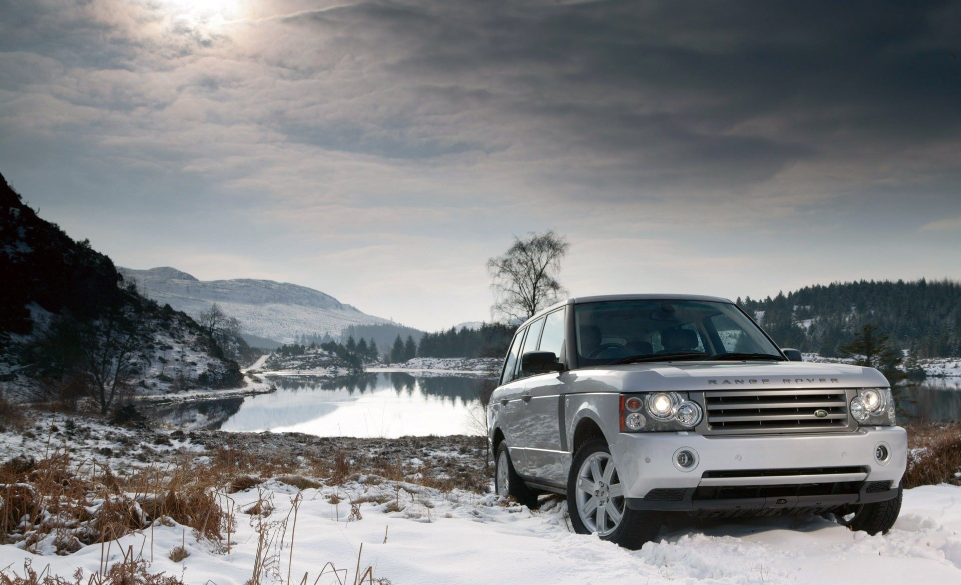 land rover śnieg jezioro zima