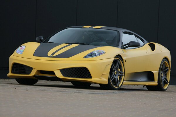 Yellow car Ferrari f430 scuderia 747 release on the road