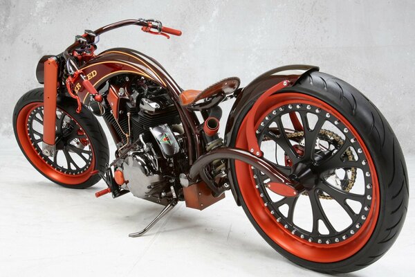 A tuned motorcycle with big wheels