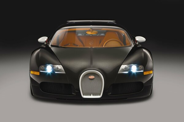 Arte máquina bugatti con faros luminosos y cabina marrón