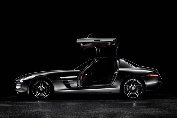 Black background side view on Mercedes amg SLS63