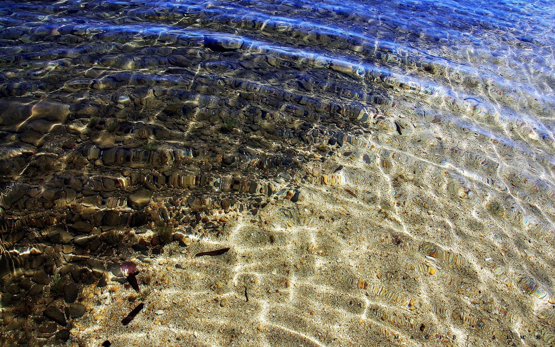 acqua pietre sabbia