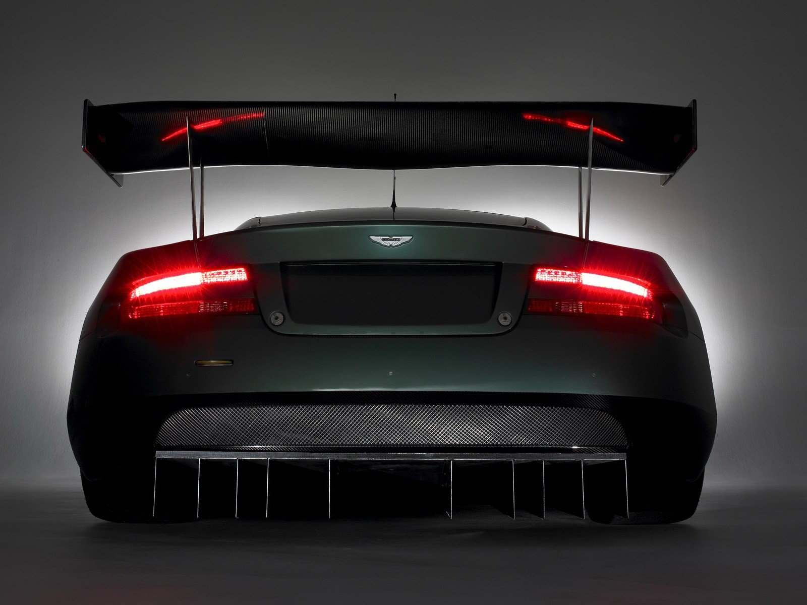 aston martin dbr9 reflektory błotnik