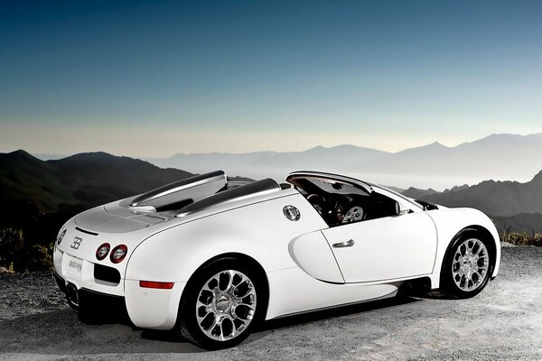 White Bugatti car in the mountains