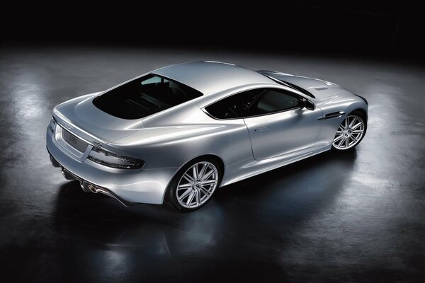 Silver atomobile of the English brand Aston Martin