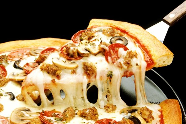 Delicious pizza pipperoni with mushrooms and cheese