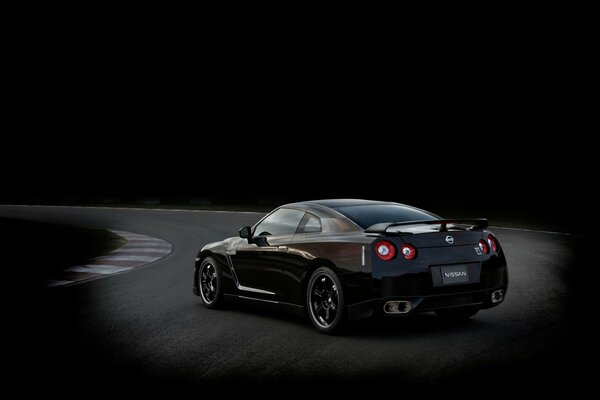 Nissan. A black car. Specially