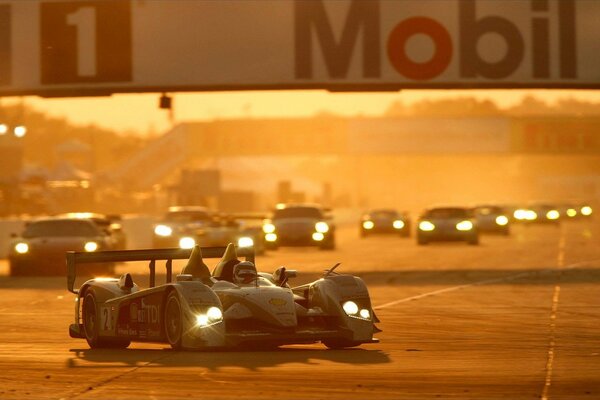 Sunset racing with lights on