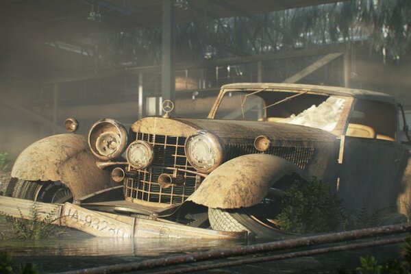 An old abandoned broken car