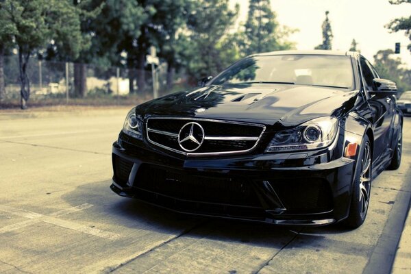 Sporty black Mercedes on the street