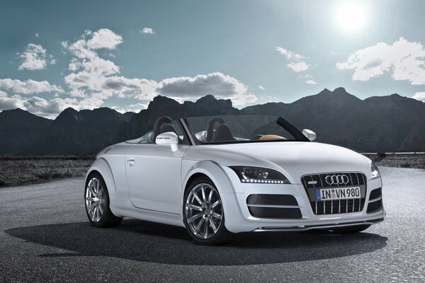 White two-door Audi