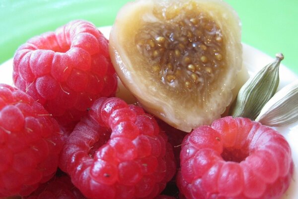 Ripe raspberries on a plate