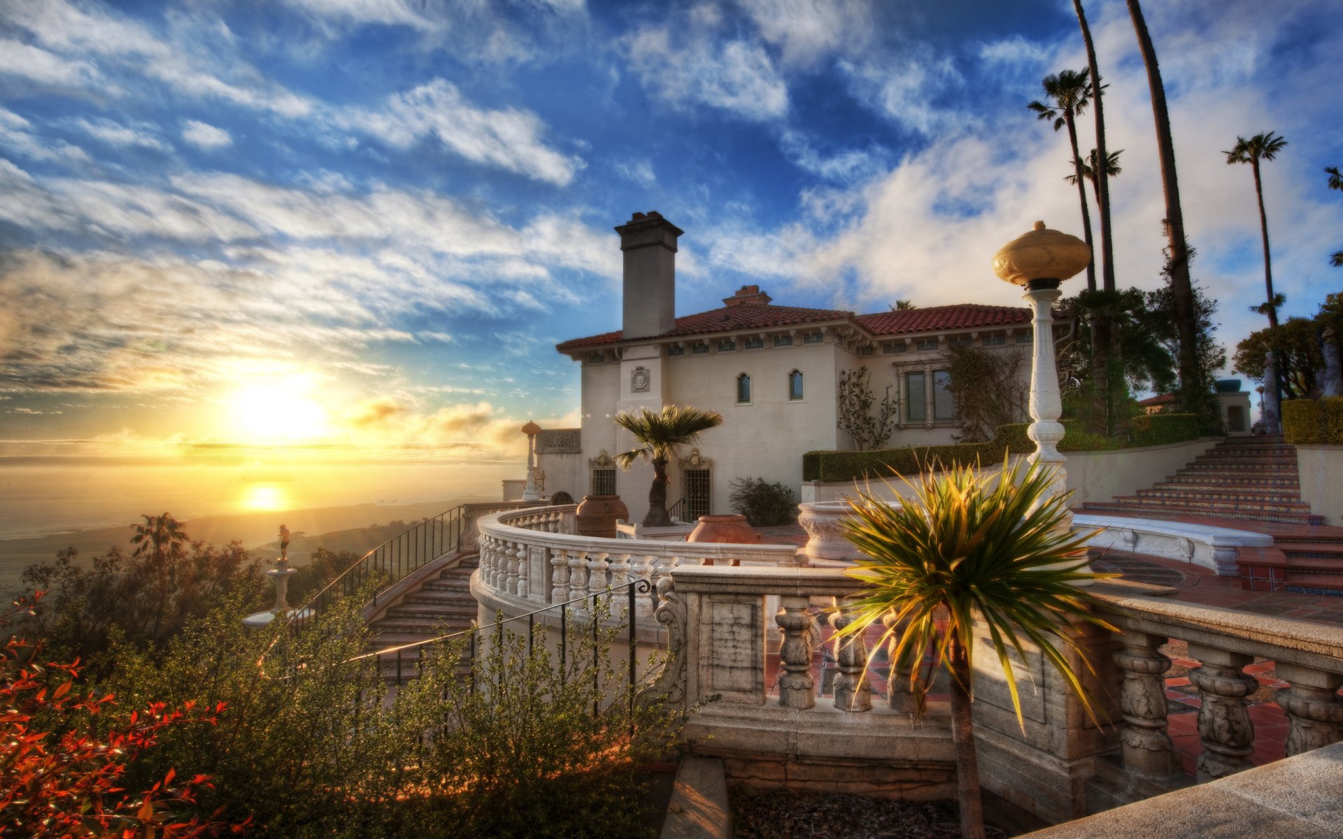 unset hearst castle house ocean cloud