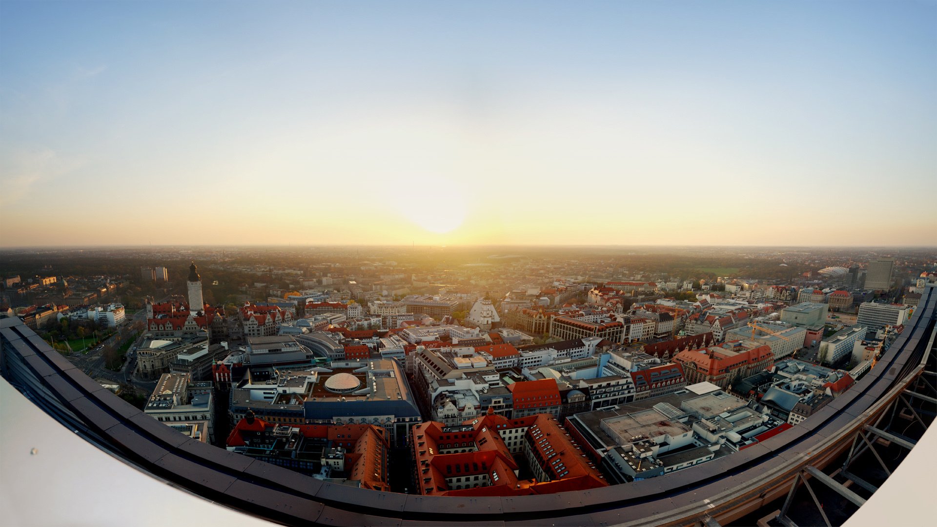 panorama słońce dachy