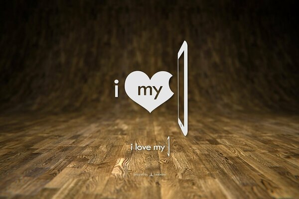 Ipad on the background of wooden parquet with a heart