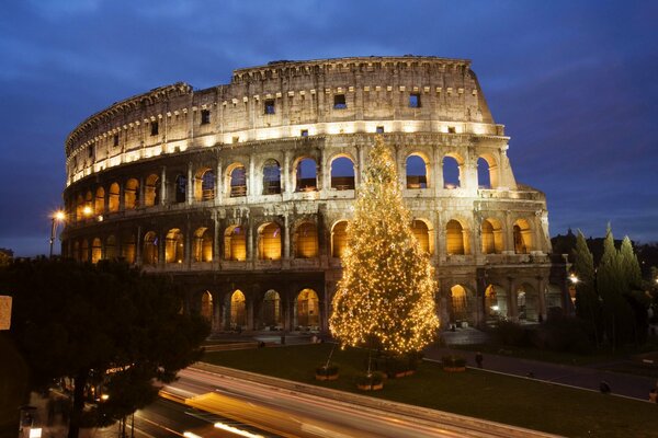 Colosseum in Rome, at night under the sky