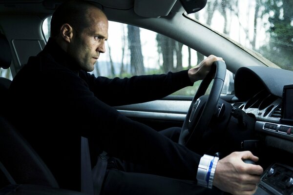 Statham che guida