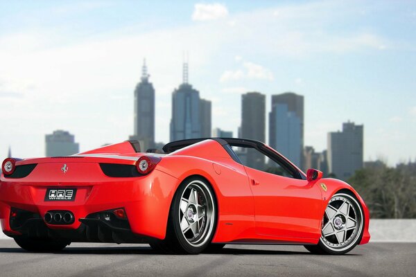 Ferrari against the backdrop of the urban landscape