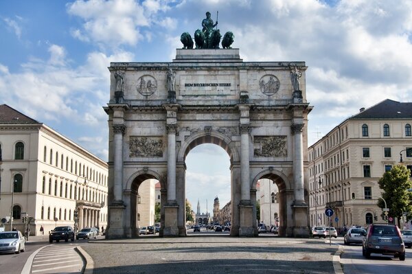 Cars and buildings in Munich during the day