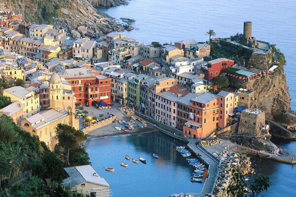 The Italian bay is hidden between houses and mountains