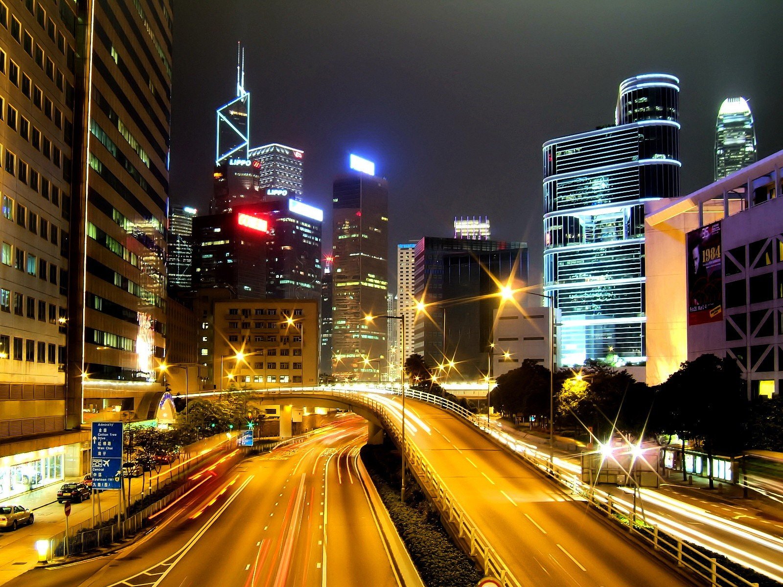 road skyscraper night lights hong kong