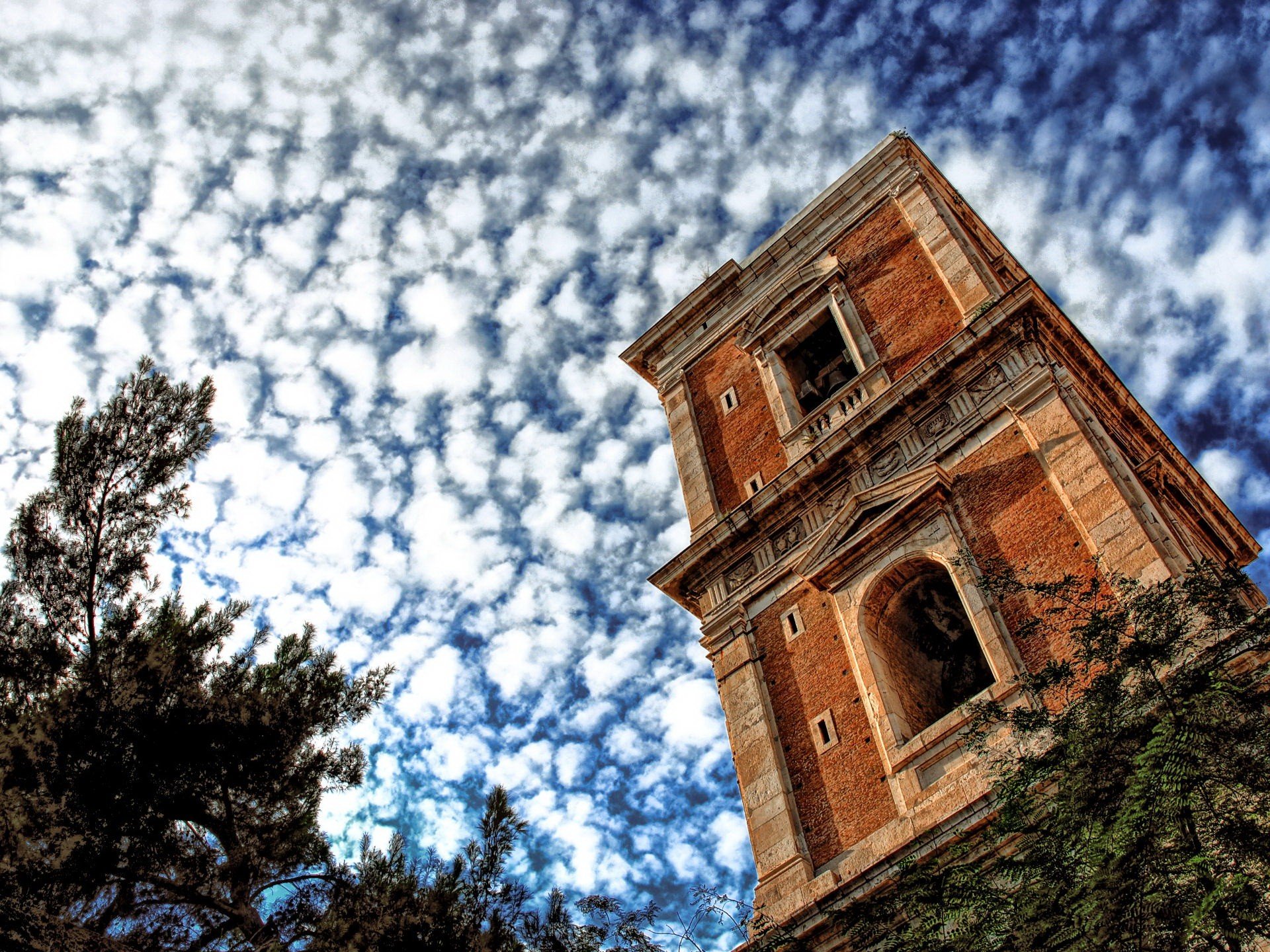 tower clouds sky