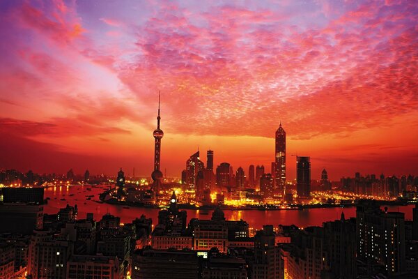 A bright sunset over the skyscrapers of Shanghai