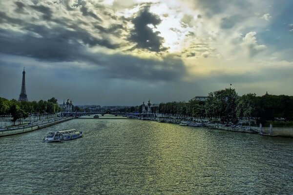 Seine in Paris. Evening sky with a glimmer of the sun